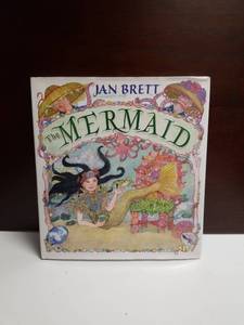 lot 2561 image: The Mermaid by Jan Brett
