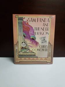 lot 2605 image: Sam Panda and Thunder Dragon by Chris Conover Childrens Book with Game