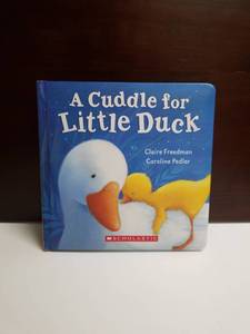 lot 2624 image: A Cuddle for Little Duck by Claire Freedman and Caroline Pedler