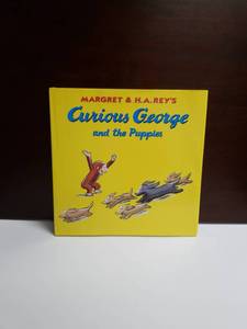 lot 2646 image: Curious George and the Puppies by Margret & H.A. Rey