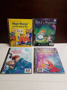 lot 2693 image: Little Golden Books Lot of 4 Bugs Bunny, Alice in Wonderland, Sleeping Beauty, Swinging Monster