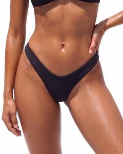 lot 4493 image: Yonique Womens Thong High Cut Swimsuit Bottom - Bikini Bathing Suit Bottom Only Black L - Retail $12