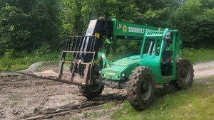 lot 100 image: 2015 Telehandler with Material Handler Attachment - Model 8042