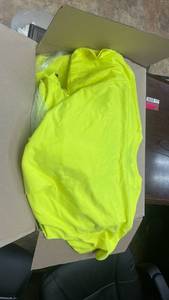lot 3715 image: High-Visibility Neon Yellow Safety Jacket with Reflective Trim and Aprons&nbsp