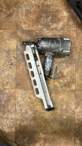 lot 8196 image: Pneumatic Coil Framing Nailer with Magazine and Handle