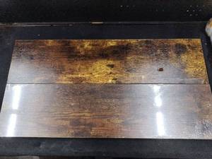 lot 5410 image: Wood-Grain Panel Table Top with Metal Mounting Hardware 2-Piece 30.5x8x2 in Has Some cracks bottom left and middle of one of the Shelves.