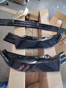 lot 1858 image: Plastic car fender parts