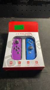 lot 12243 image: JC Pad For NSL Wireless Controller 2-Pack Purple Blue