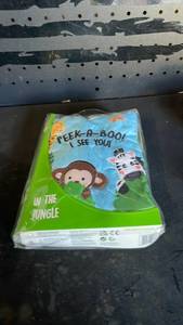 lot 12328 image: Peek-A-Boo I See You In the Jungle Infant Board Book
