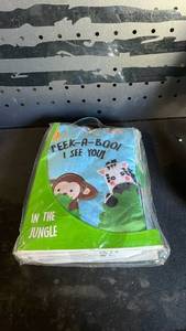 lot 12399 image: Peek-A-Boo I See You In The Jungle Infant Book