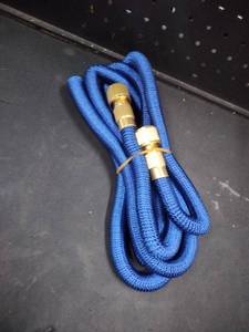 lot 6308 image: Blue Braided Hose with Brass Fittings and Adapter Set approximately 25 ft