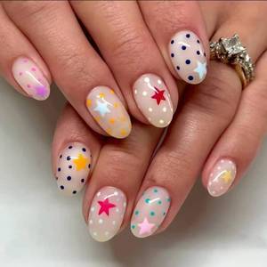 lot 20383 image: Medium Oval Press on Nails, White Fake Nails with Colorful Star & Polka Dot Design, Full Cover Glue on Nails, Reusable Cute Stick On Nails for Women Manicure 24Pcs