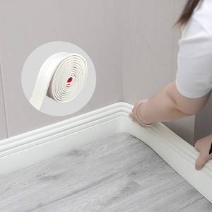 lot 2242 image: COUKIU Flexible Baseboard Molding Trim, Peel and Stick Rubber Wall Base Moulding Trim, 4 Inch x 16.4 Feet Self-Adhesive Vinyl Wall Base Cove Base (Creamy White)