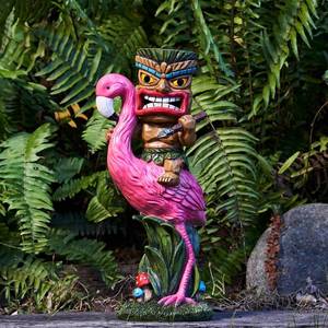 lot 3244 image: Yiosax Solar Tiki Statue - Outdoor Statue - Solar Powered Garden Figurine Tiki Decoration for Bar, Patio, Balcony, Yard, Lawn, Table, Riding a Flamingo 13.66 Inches Tall