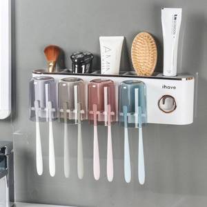 lot 3255 image: iHave Toothbrush Holders Bathroom Accessories with Toothpaste Dispenser, 4 Cups Toothbrush Holder Wall Mounted Bathroom Decor