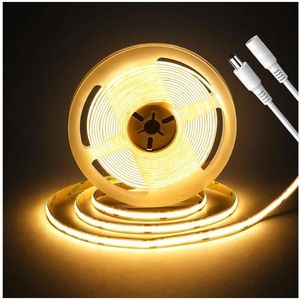 lot 17344 image: Gold Yellow COB LED Strip Light 16.4ft, DC 24V 320 LEDsm Dotless LED Tape, 8mm Flexible Cuttable Strip for Cabinet Shelf Bedroom Accent Lighting, Power Supply Not Included - Retail $18
