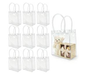 lot 17497 image: 10 PCS Clear Gift Bags with Handles(2.7x5.1x5.9 Inch) Reusable Transparent PVC Tote Goodie Bags Bulk Wedding Brthday Holiday Party Favors Supplies Wrap Basket Stuffers Goody Pouch Baggies. - Retail $7