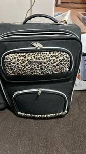 lot 40452 image: Bon Voyage Paris Black Leopard Print Carry-On Luggage