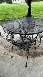 lot 40480 image: Black Wrought Iron Mesh Patio Table and Chair Set