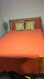 lot 60513 image: Queen Size Wood Sleigh Bed Frame NOT the mattresses and bedding