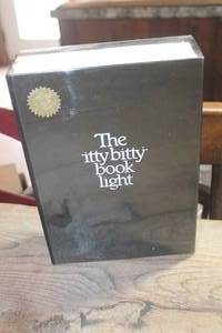 lot 1562 image: NIB The itty bitty Book Light