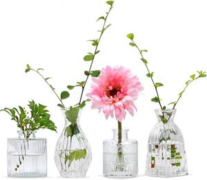 lot 452197 image: Glass Bud Vases Set of 4, Small Flower Vases for Wedding Centerpiece  Clear Vintage Embossed Mini Vases for Table Decorations, Flower Arrangements in Vases for Party or Home Decor