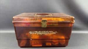 lot 25 image: Vintage Amber Lucite Sewing Box with Floral Decoration and Assorted Notions