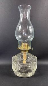 lot 62 image: Oil Lamp with Clear Glass Chimney and Brass Fittings