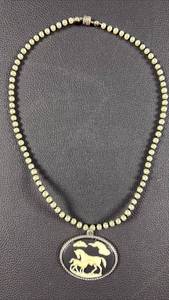 lot 63 image: Pearl Beaded Necklace with Horse Cameo Pendant