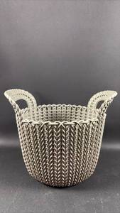 lot 97 image: Curver Knit Round Basket features a durable plastic design textured to mimic traditional hand-knitted textiles.