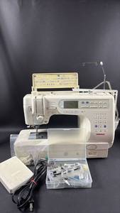 lot 100 image: AMAZING FIND Janome Memory Craft 6600 Computerized Professional Sewing Machine with Plenty of Accessories