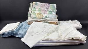 lot 143 image: Lot of Linens and Textiles Including Tablecloths Placemats Napkins and Dish Towels