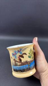 lot 208 image: Made in Germany Mustache mug includes a distinctive interior ledge designed to protect a mustache while drinking.