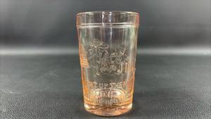 lot 209 image: Tiara Pink Glass Jack and Jill Embossed Juice Cup