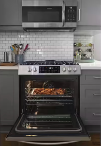 lot 13 image: Frigidaire Gas Range 5 Burner Stainless Steel Slide-In - Retail $1,999