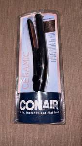 lot 52223 image: Conair 34 in. Instant Heat Flat Iron Ceramic-Coated Plates 25 Heat Settings - Retail $24