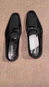 lot 52229 image: Mocassin Black Loafers with Metal Bar Detail, Pair size 7.5 - Retail $49