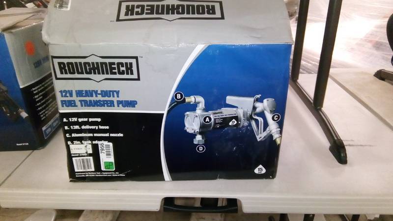 lot 7956 image: Roughneck 12V Heavy-Duty Fuel Transfer Pump.