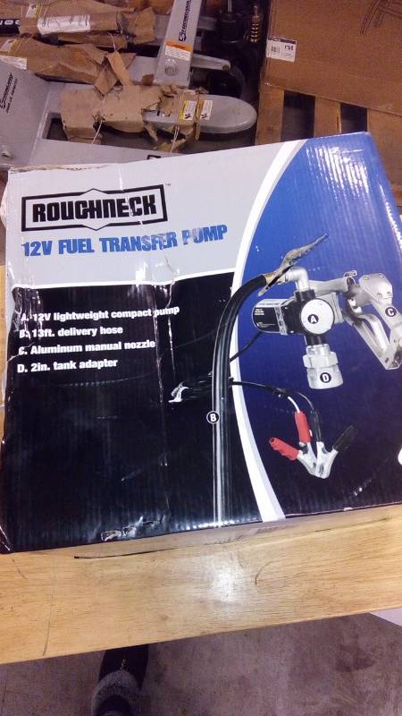 lot 7959 image: Roughneck 12V Fuel Transfer Pump  8 GPM, Manual Nozzle, Hose