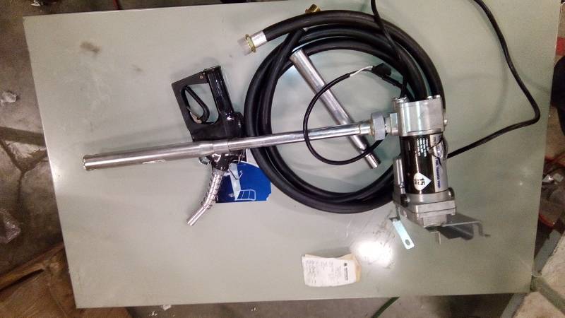lot 7963 image: Roughneck 12V Heavy-Duty Fuel Transfer Pump.