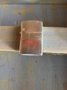 lot 104 image: Zippo Lighter with Engraved Text