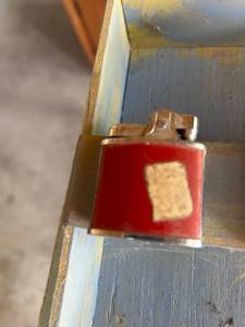 lot 106 image: Pocket Lighter Red Panel with Silver-Tone Case
