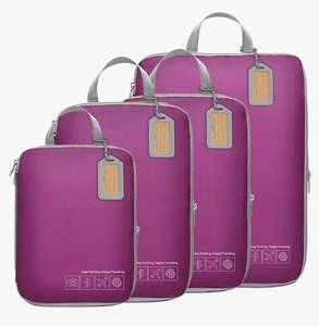 lot 28045 image: Compression Packing Cubes for Travel - Lightweight Expandable Travel Bags Luggage Organizers Travel Essentials Compression Cubes for Travel Space Saver for Carry on Suitcases Organizer. - Retail $17
