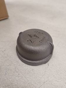 lot 17060 image: Jones Stephens Malleable Iron Fittings 2 Inch Cap