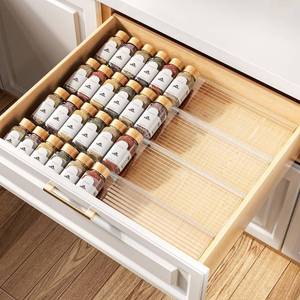 lot 4047 image: MUDEELA Clear Spice Drawer Organizer, 4 Tier- 2 Set (8 Packs) Spice Rack for Drawer, Expandable From 11 to 22 Kitchen Seasoning Organizers and Storage for Drawer (Jars not included)