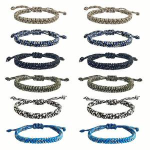 lot 4141 image: YANMIN 12 pcs Braided Friendship Bracelets for Teen Boys Adjustable Paracord Bracelets Handmade Goody Bag Stuffers Easter Basket Filler Tween Teenager Birthday Christmas Camping Party Favors