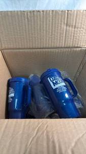 lot 15 image: Davis-Moore Travel Mugs Set of 12 Blue with Lids