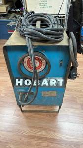 lot 17 image: Hobart Welder with Cables and Ground Clamp