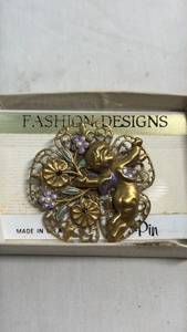 lot 78 image: Fashion Designs Cherub Floral Pin