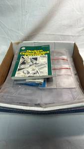 lot 245 image: Collectible Storage Lot Coin Sleeves, Modern US Currency Book, Trading Card Pages, Wallet Photo Protector